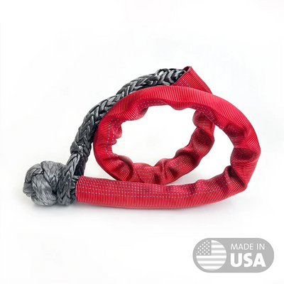 Red and gray dog toy with a braided handle on a white background, featuring 'Made in USA' label.