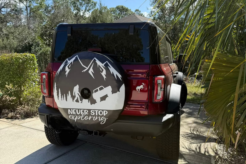 Never Stop Exploring Spare Tire Cover - Goats Trail