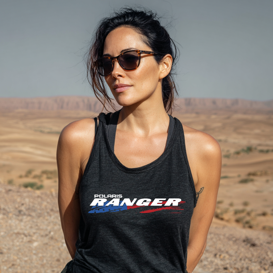 Woman wearing a black tank top with Polaris Ranger logo in a desert setting