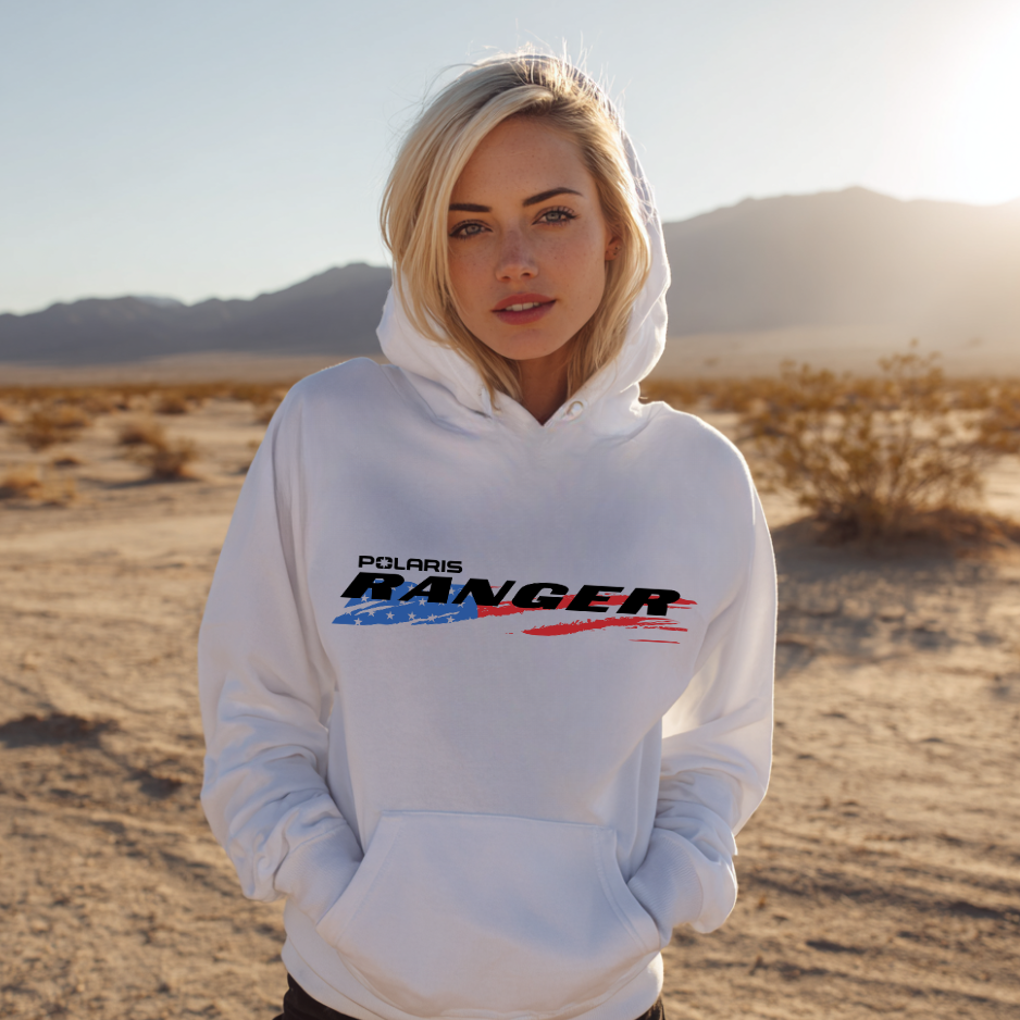 Person wearing a white hoodie with Polaris Ranger logo in a desert setting