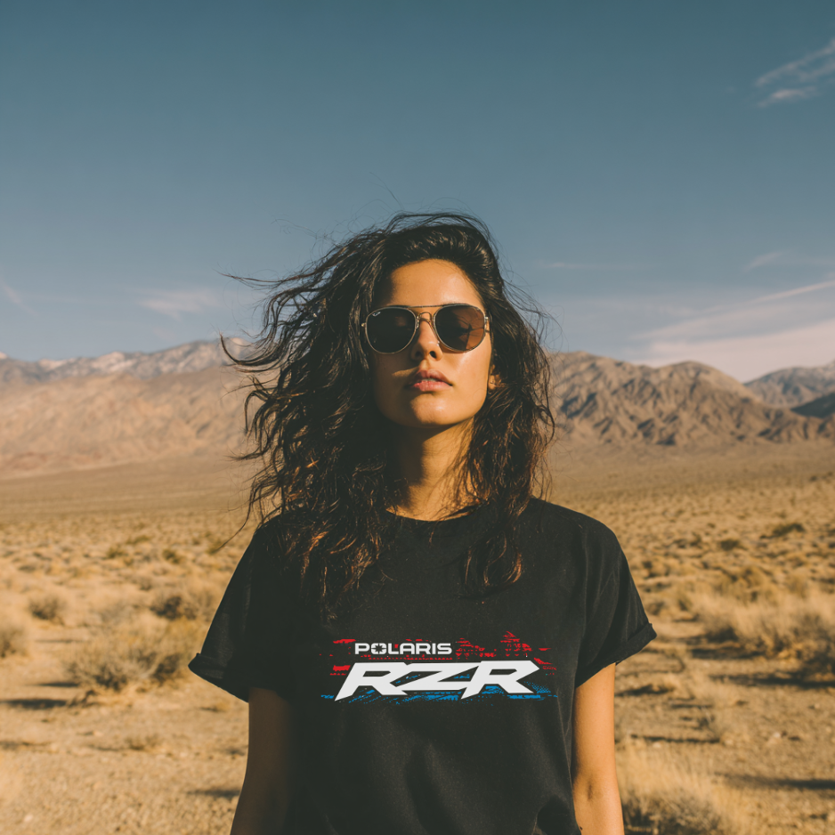 Person wearing a Polaris RZR shirt in a desert landscape